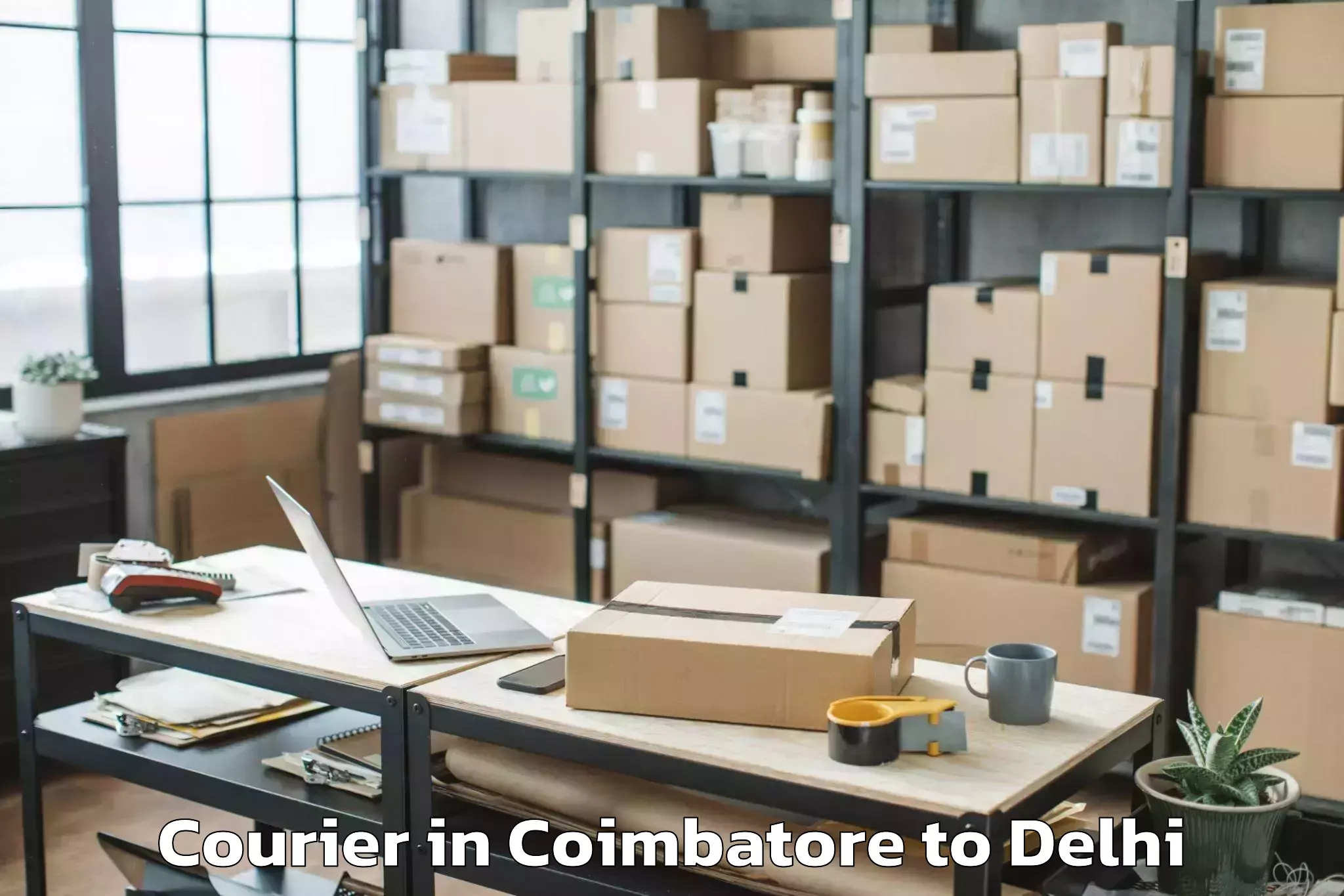 Book Coimbatore to Indira Gandhi International Ai Courier Online